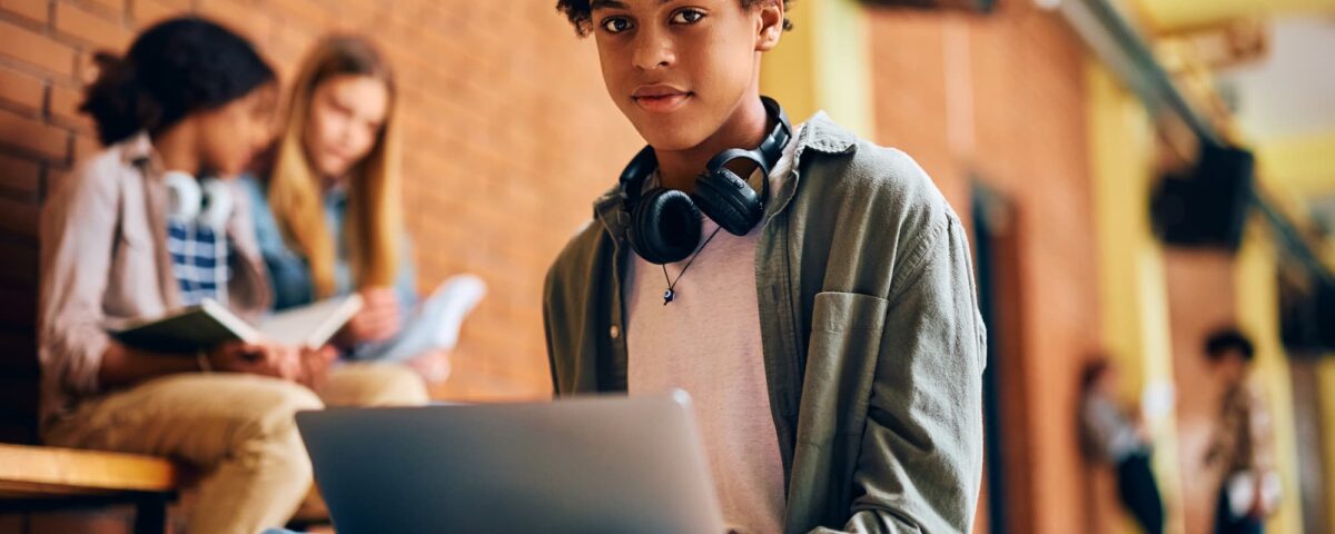 student using laptop craven college