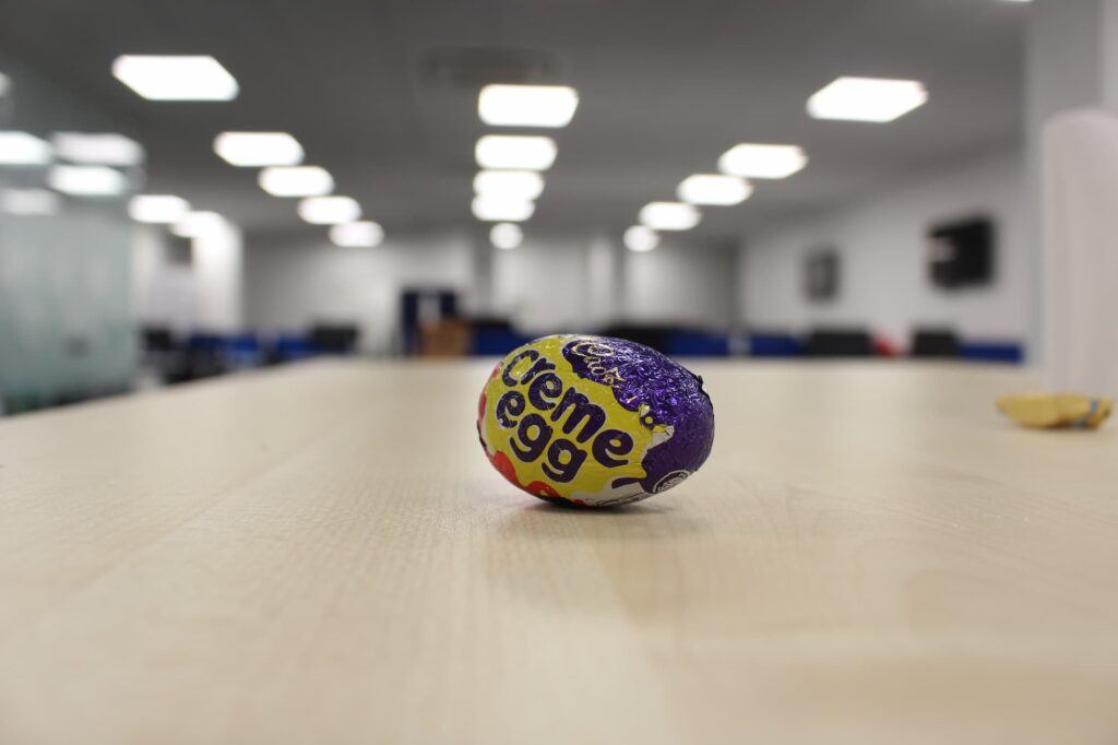 Creme egg on table in office