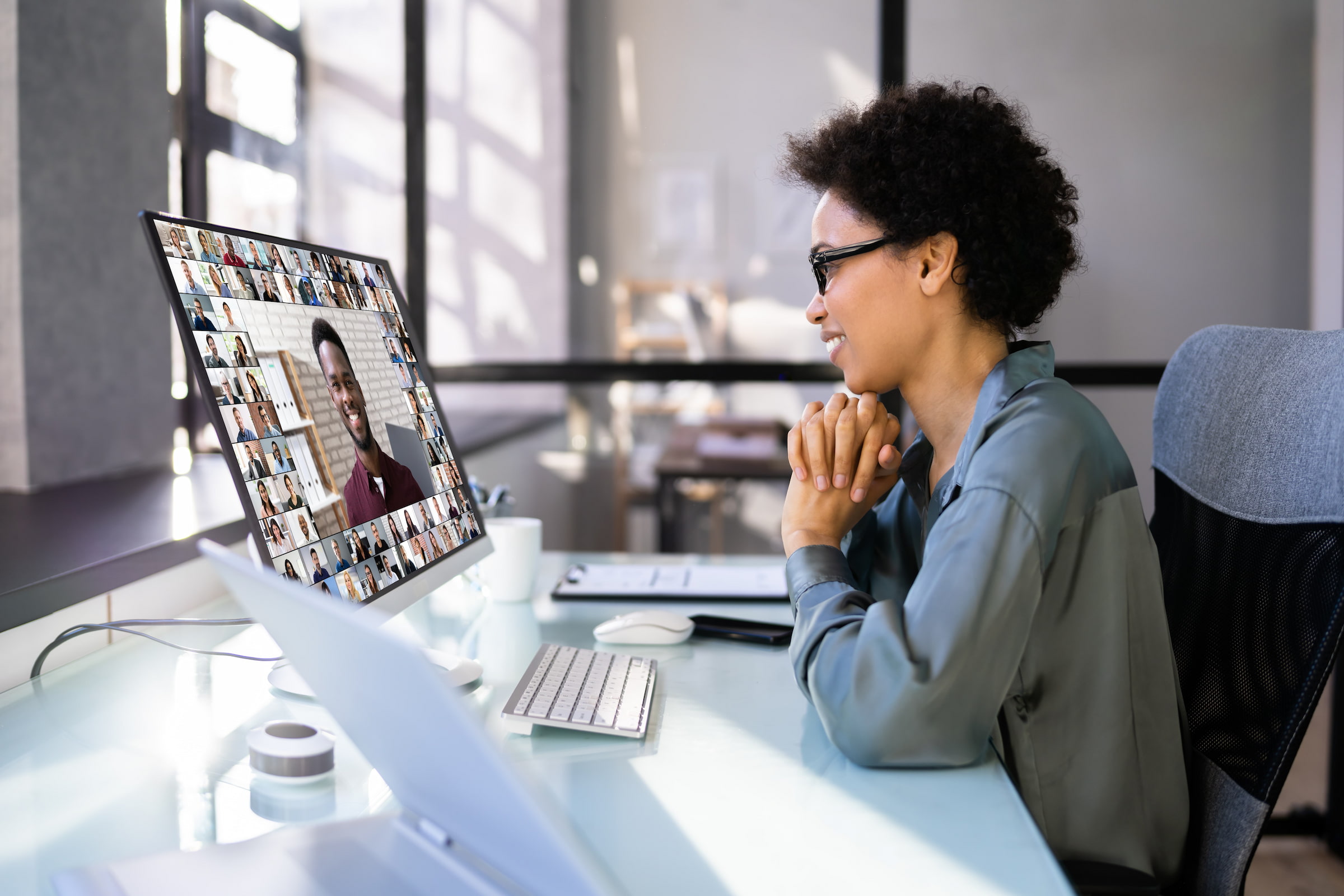 woman video conference team in office pc