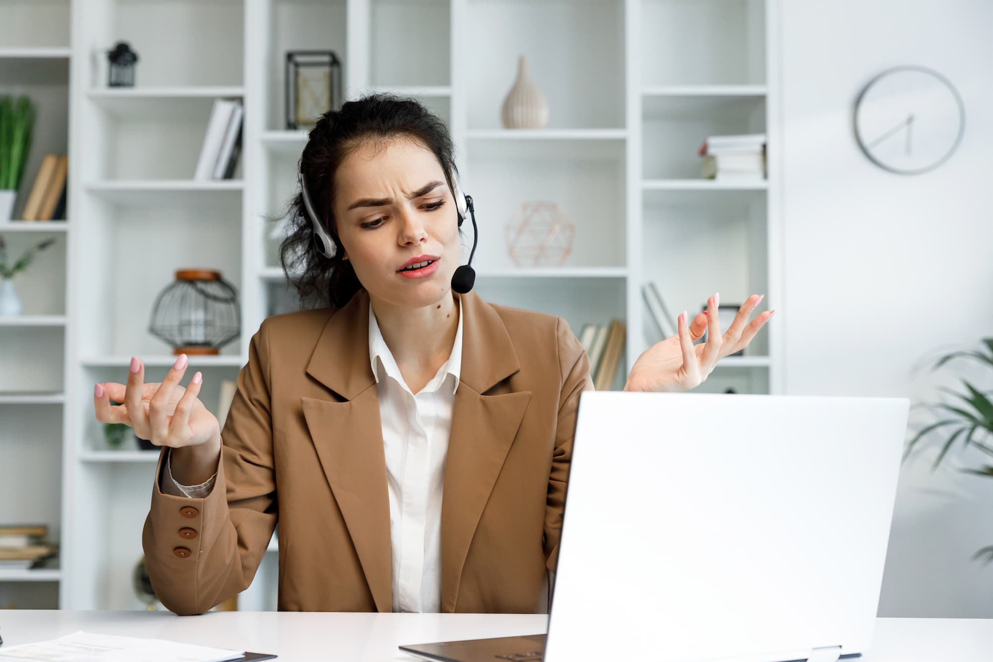 woman struggling with headset (1)