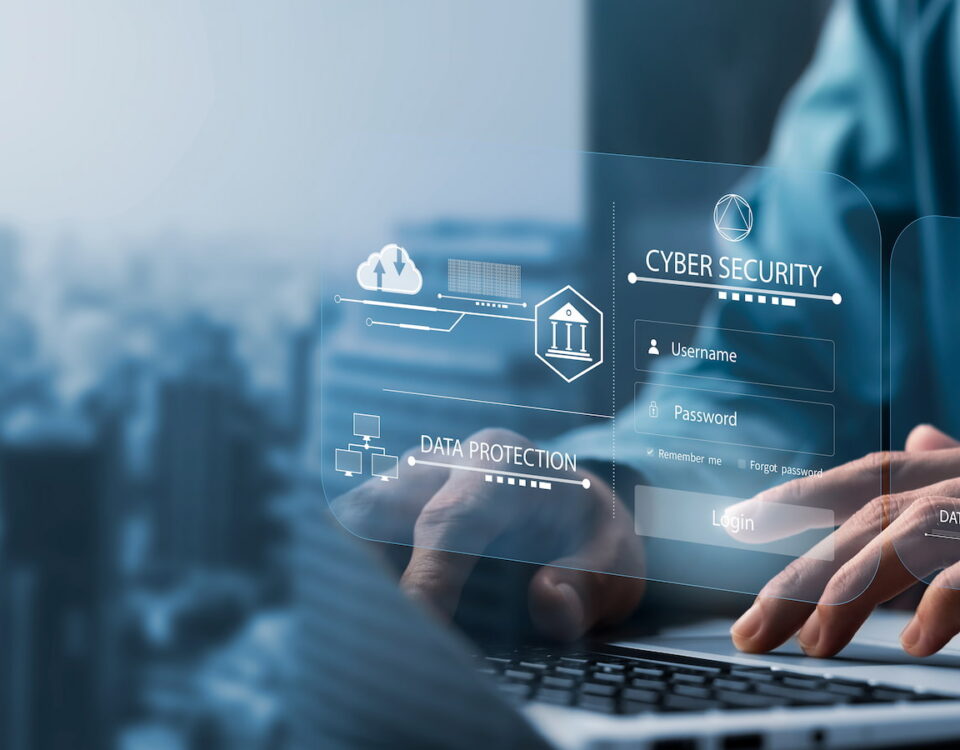 Tippen auf einer Tastatur mit einer grafischen Überlagerung eines Unternehmensnetzwerks für Cybersicherheit